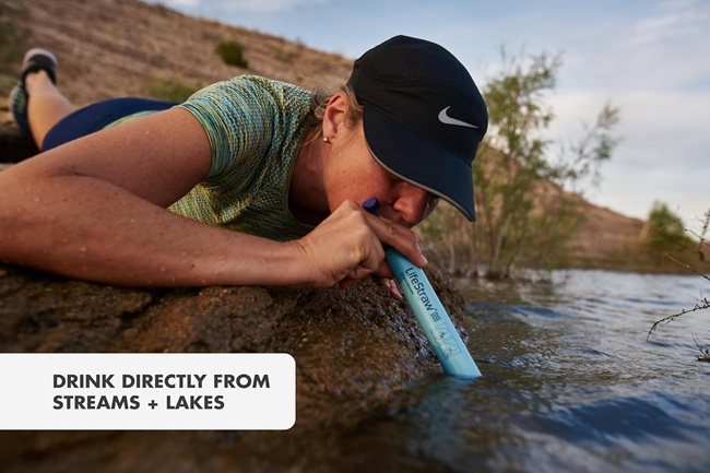 lifestraw being used while hiking