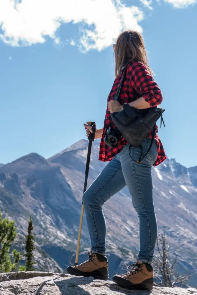 female hiker in jeans