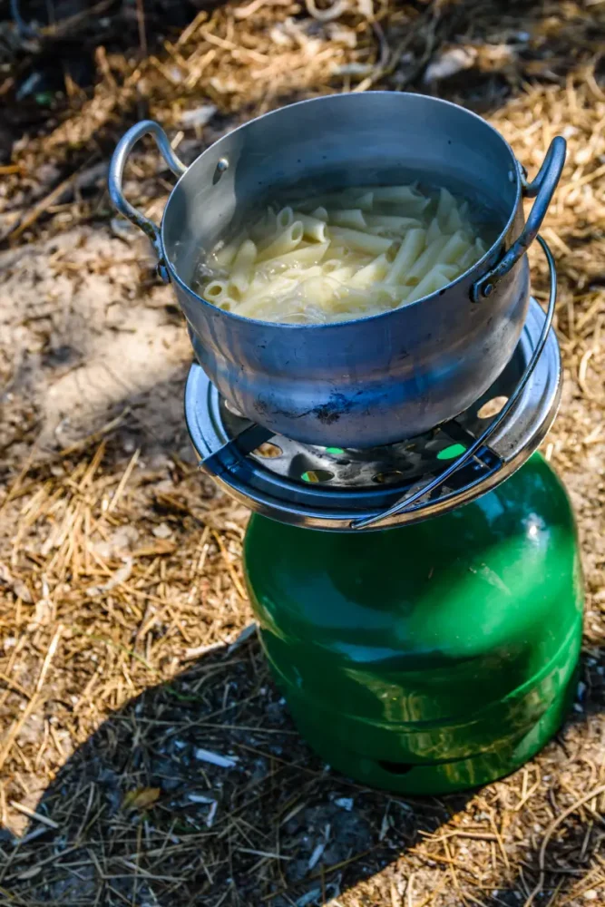 cooking pasta on a camp stove