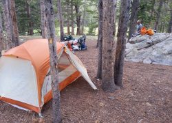 DIY tent footprint made from Tyvek laid under a pitched tent