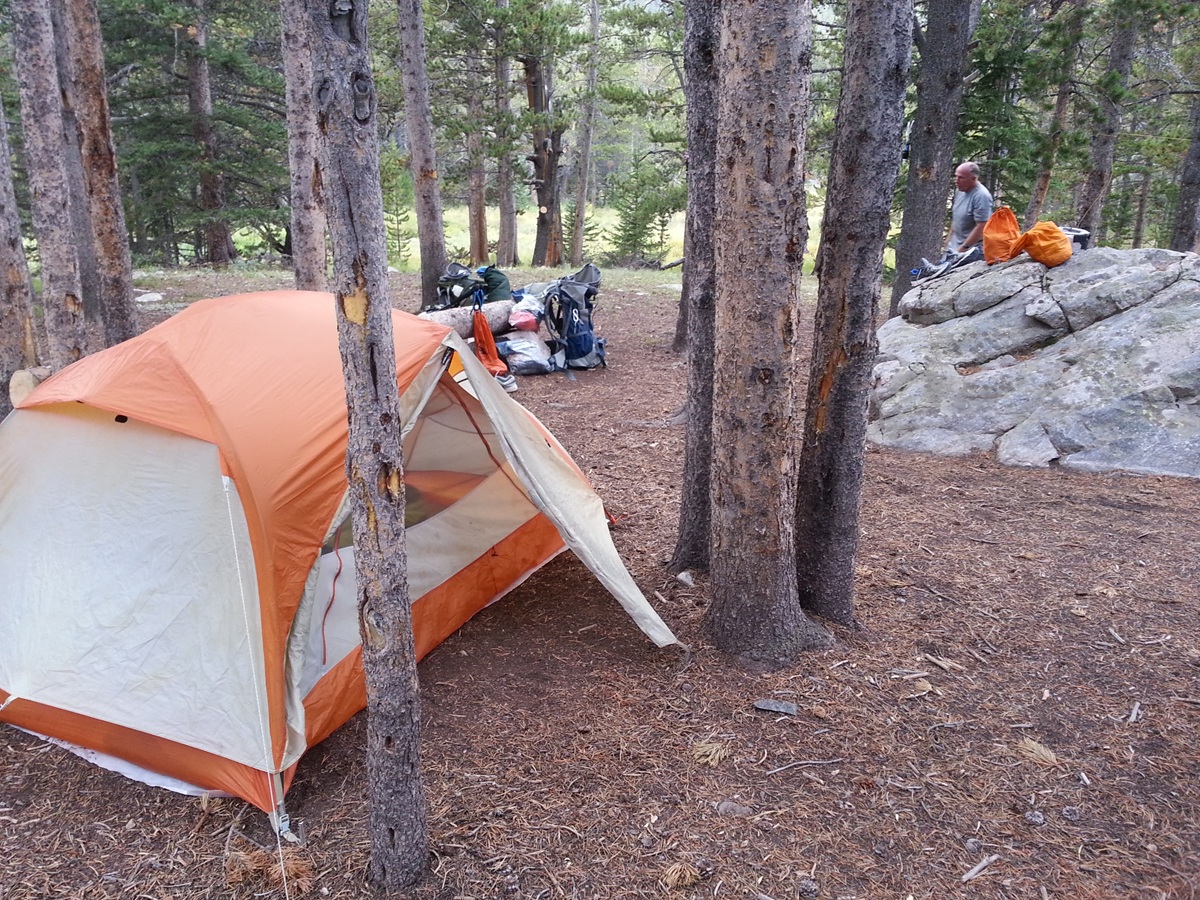 DIY tent footprint made from Tyvek laid under a pitched tent