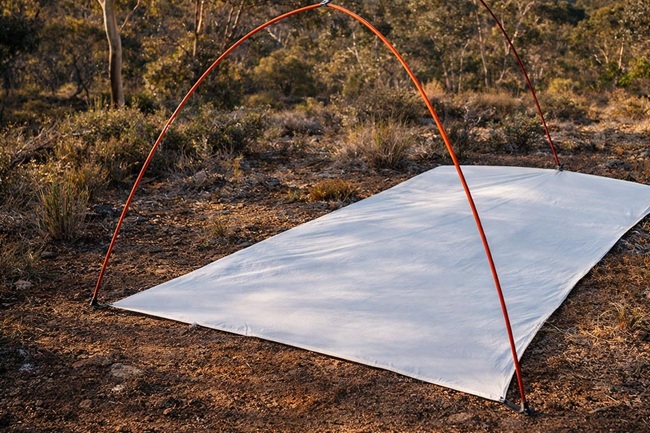 Tyvek sheet, tarp, and window film used to make a tent footprint
